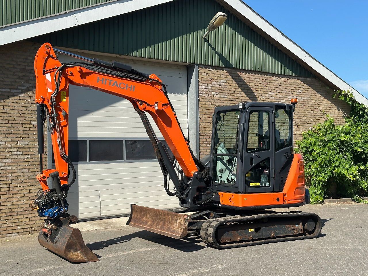 2015 Hitachi ZX65USB-5A mini excavator, side view