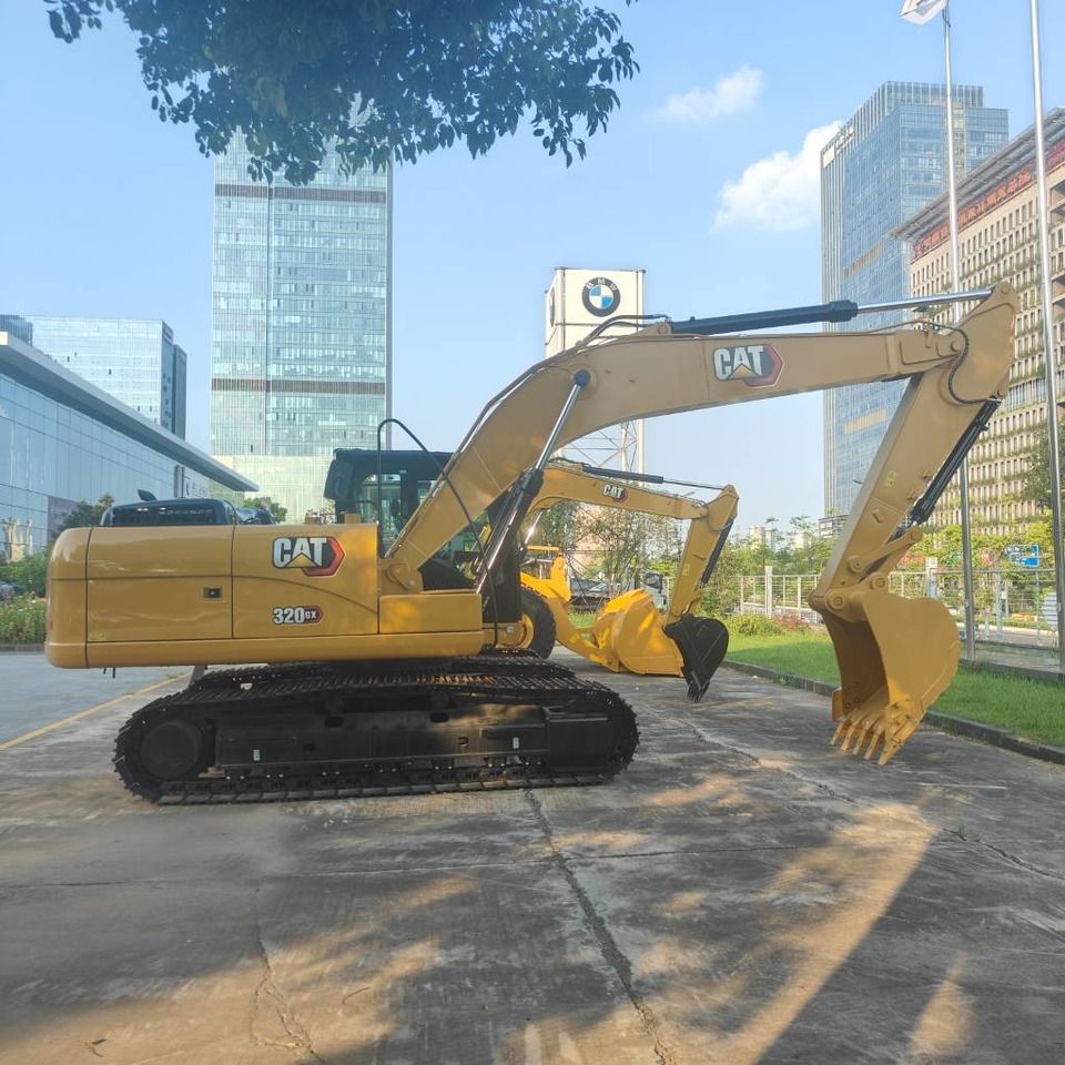 2025 Caterpillar 320GX crawler excavator, side view