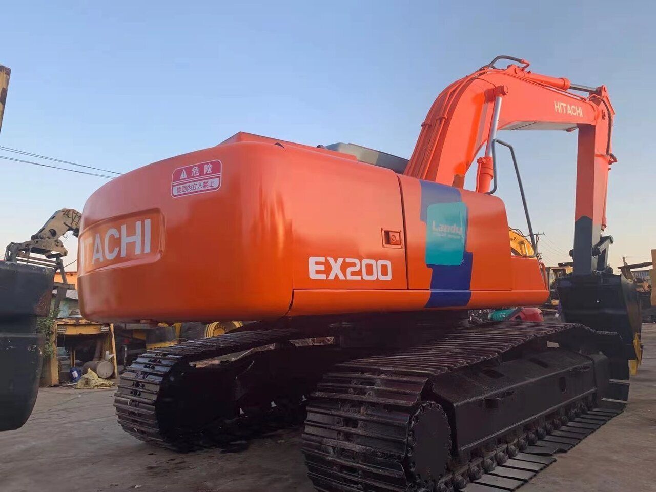 2016 Hitachi EX200-2 crawler excavator, rear three-quarter view 2016 Hitachi EX200-2 crawler excavator, rear three-quarter view