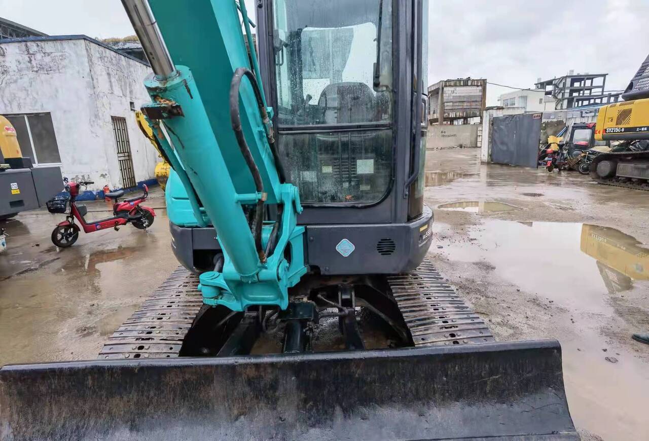2015 Kobelco 55 mini excavator, front view of blade and boom
