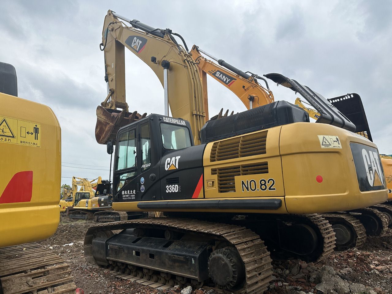 2019 Caterpillar 336D2 crawler excavator, rear three-quarter view 2019 Caterpillar 336D2 crawler excavator, rear three-quarter view