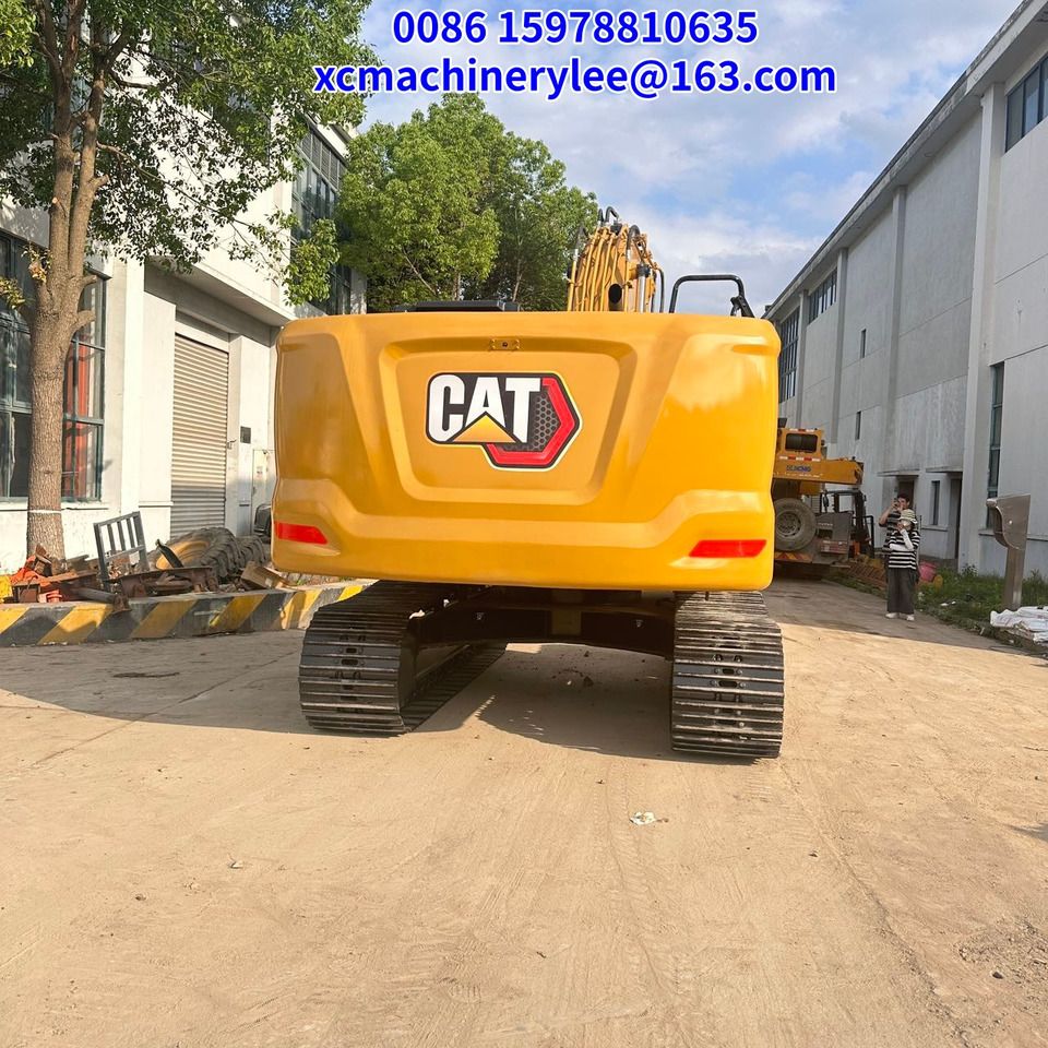 2023 Caterpillar 320GC crawler excavator, rear view