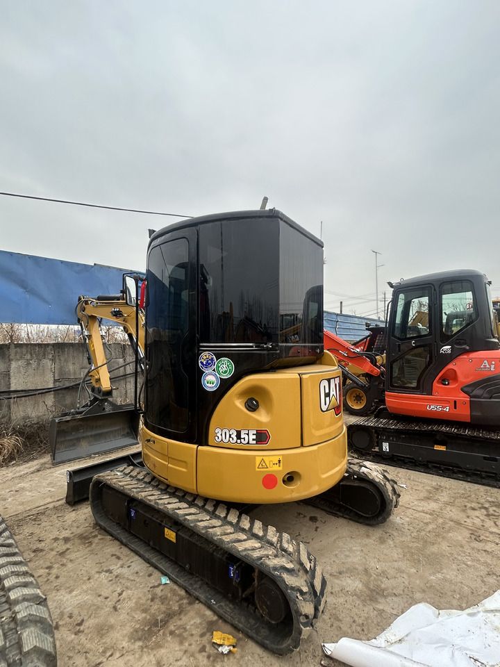 2024 Caterpillar 303.5E mini excavator, rear three-quarter view 2024 Caterpillar 303.5E mini excavator, rear three-quarter view