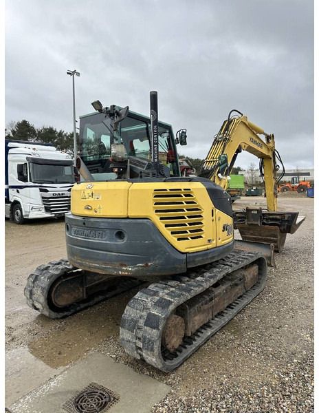 2014 Yanmar SV 100 mini excavator, rear three-quarter view 2014 Yanmar SV 100 mini excavator, rear three-quarter view