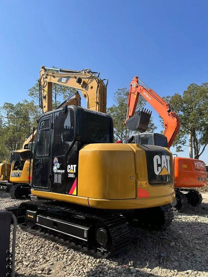 2024 Caterpillar 308E2 crawler excavator, rear three-quarter view 2024 Caterpillar 308E2 crawler excavator, rear three-quarter view