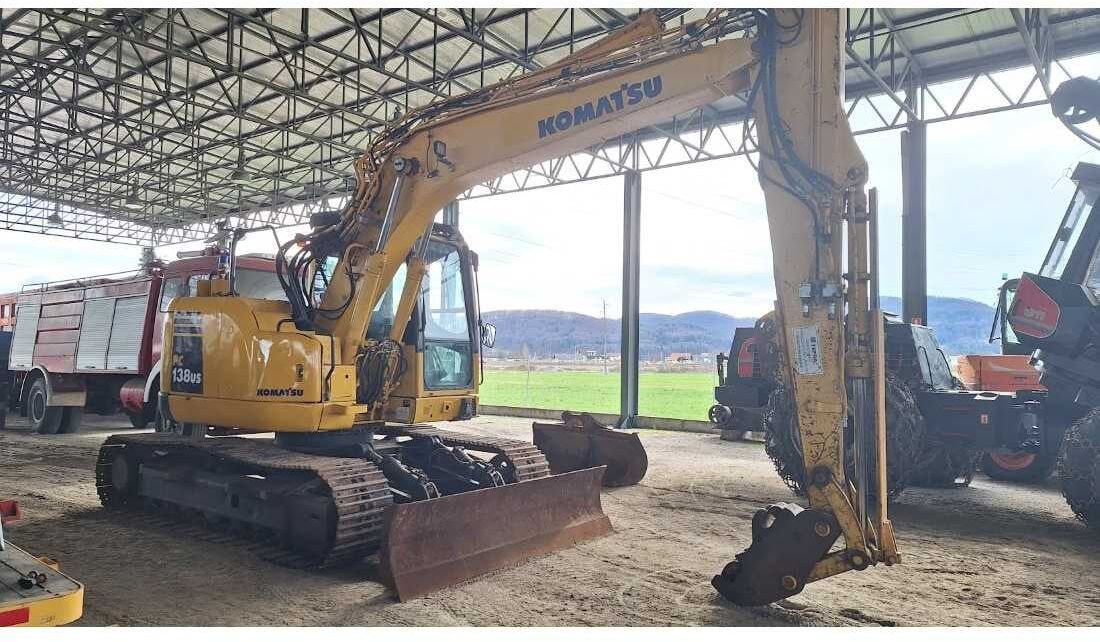 Komatsu PC138US-8 crawler excavator side view Komatsu PC138US-8 crawler excavator side view