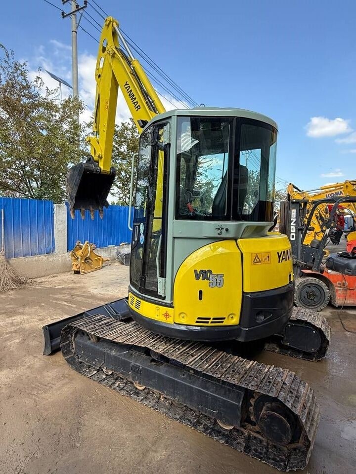 2025 Yanmar VIO55 mini excavator, rear three-quarter view 2025 Yanmar VIO55 mini excavator, rear three-quarter view