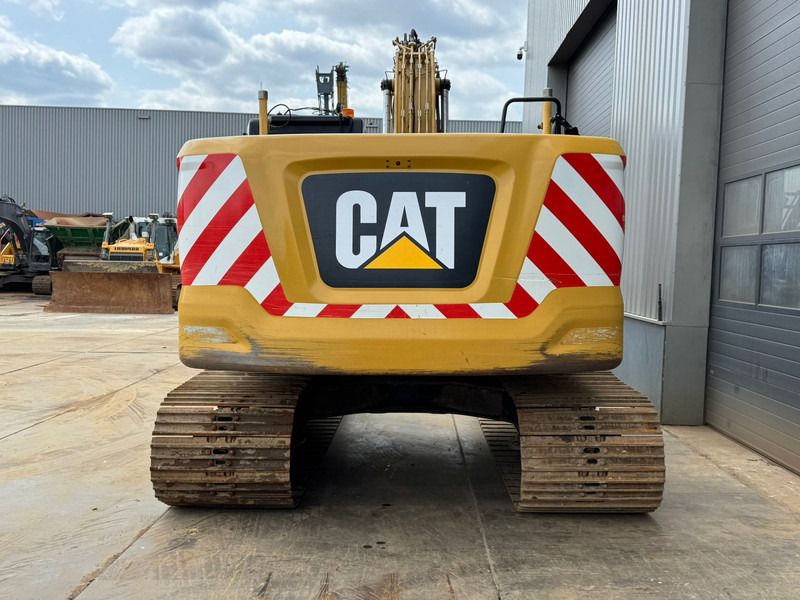 2018 Caterpillar 323-07A crawler excavator, rear view 2018 Caterpillar 323-07A crawler excavator, rear view