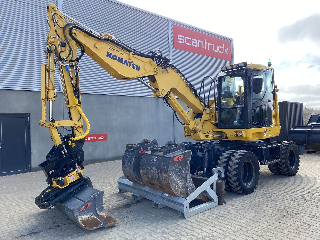 2019 Komatsu PW118MR-11 wheel excavator, side view