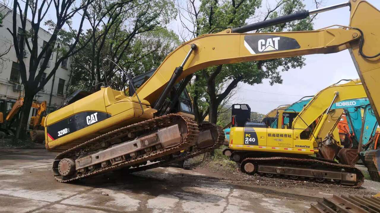 2018 Caterpillar 320D2 rupsgraafmachine zijaanzicht 2018 Caterpillar 320D2 rupsgraafmachine zijaanzicht
