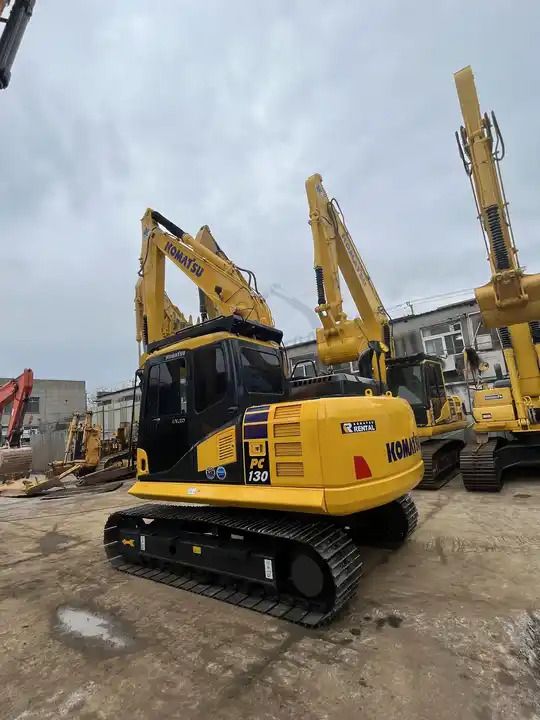 2020 Komatsu PC130-7 crawler excavator, rear three-quarter view 2020 Komatsu PC130-7 crawler excavator, rear three-quarter view
