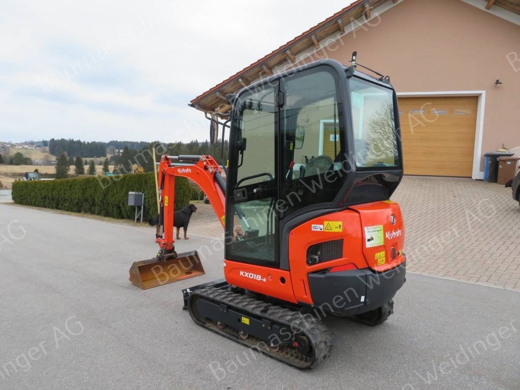 2022 Kubota KX018-4 mini excavator, rear three-quarter view 2022 Kubota KX018-4 mini excavator, rear three-quarter view