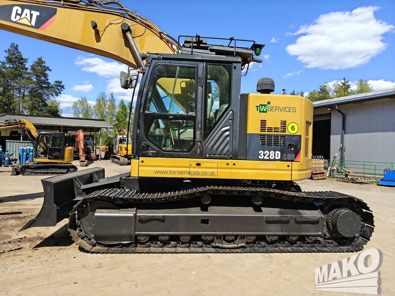 2012 Caterpillar 328D LCR crawler excavator, side view 2012 Caterpillar 328D LCR crawler excavator, side view