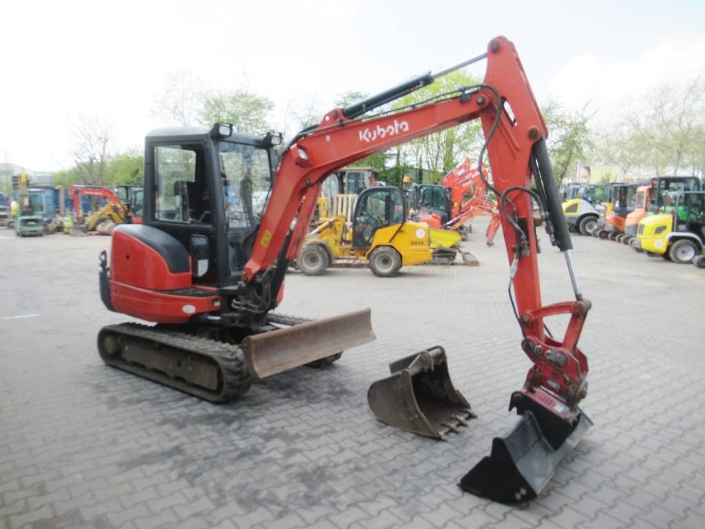 2015 Kubota KX101-3A3 mini excavator, side view 2015 Kubota KX101-3A3 mini excavator, side view