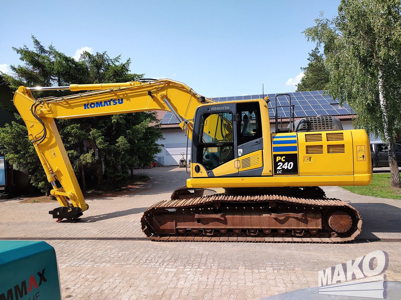 2012 Komatsu PC240LC-10 crawler excavator, side view