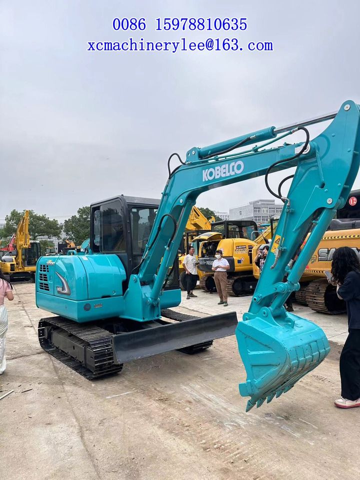 2024 Kobelco SK60 mini excavator, three-quarter front view 2024 Kobelco SK60 mini excavator, three-quarter front view
