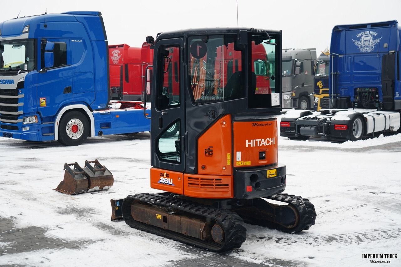 2022 Hitachi ZX26U-6 mini excavator, rear three-quarter view 2022 Hitachi ZX26U-6 mini excavator, rear three-quarter view
