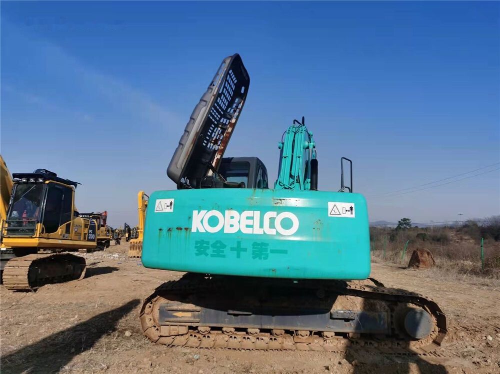 Kobelco SK210 crawler excavator rear view Kobelco SK210 crawler excavator rear view