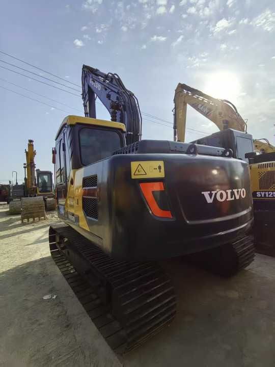2023 Volvo EC140 crawler excavator, rear three-quarter view