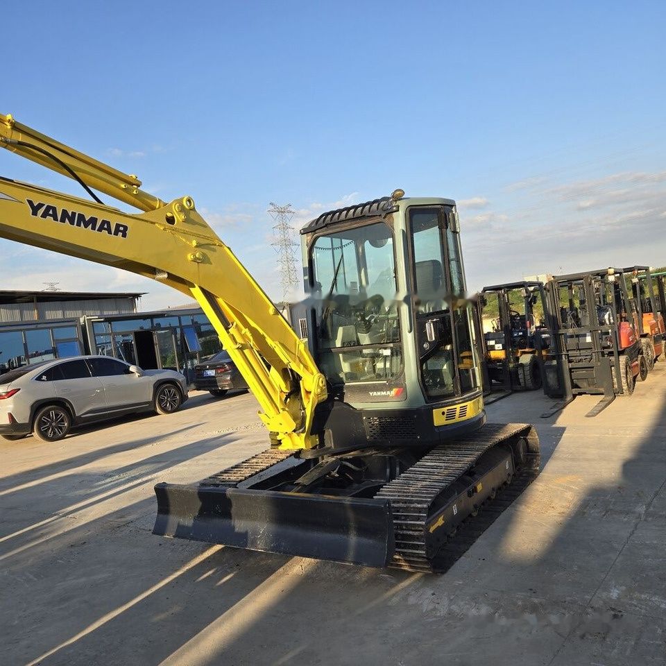 2023 Yanmar VIO55 mini excavator, front three-quarter view 2023 Yanmar VIO55 mini excavator, front three-quarter view