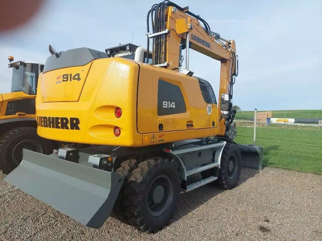 2022 Liebherr A914 Litronic wheel excavator rear three-quarter view