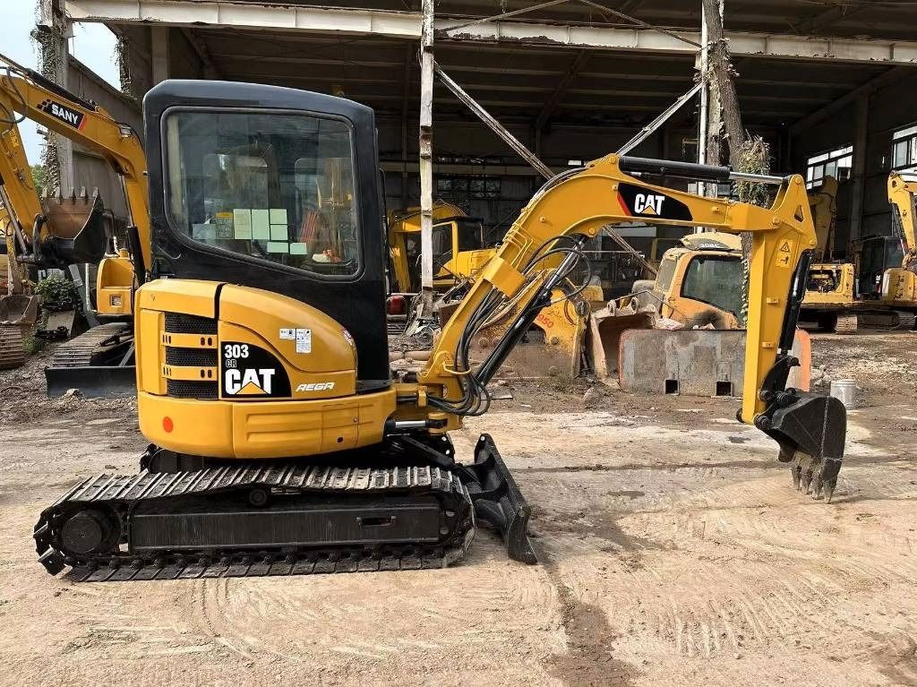 2022 Caterpillar 303 CR mini excavator, side view