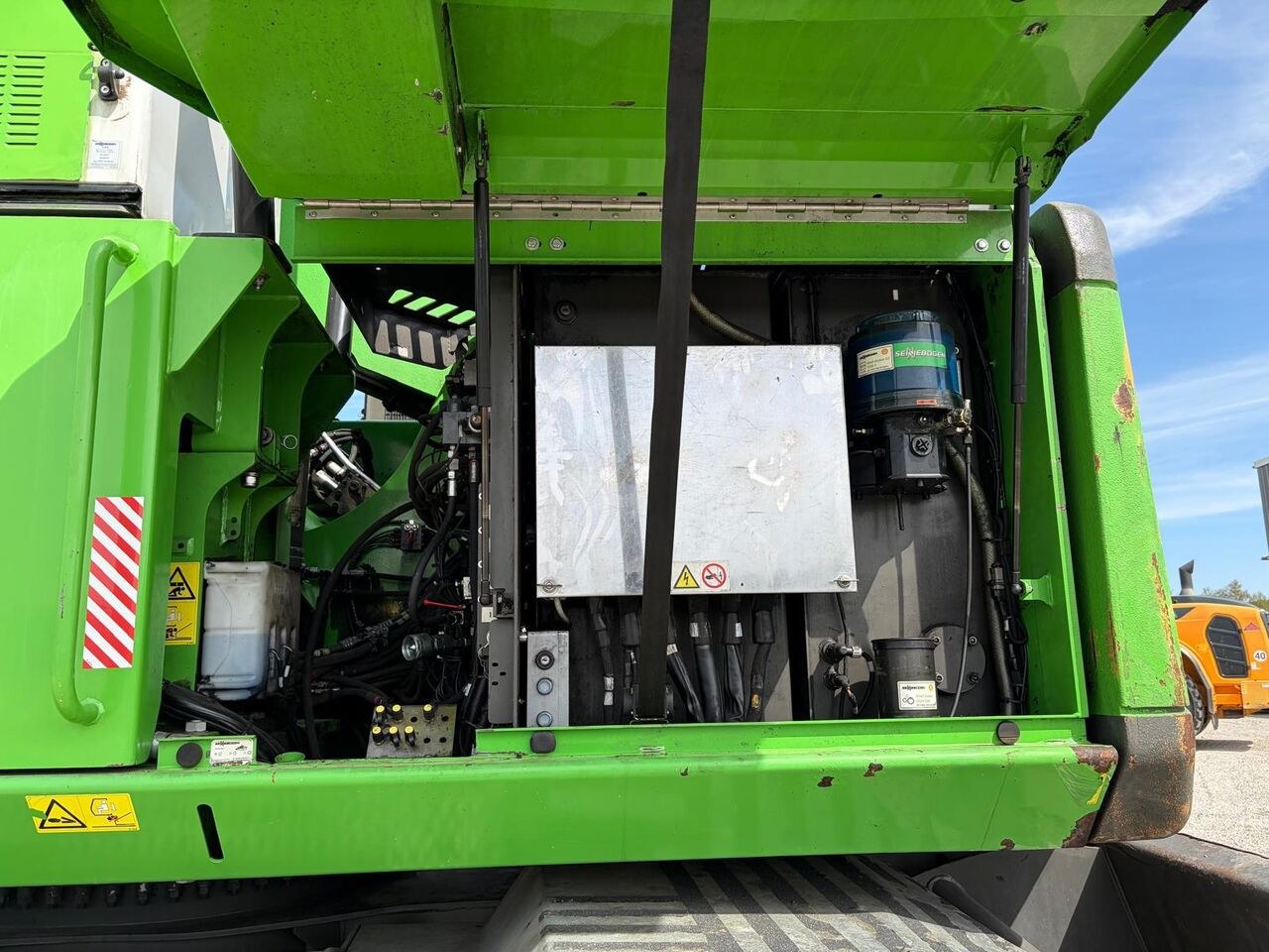2016 Sennebogen 730E wheel excavator engine compartment view
