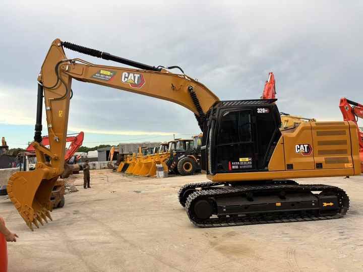 2024 Caterpillar 320GC crawler excavator, side profile view