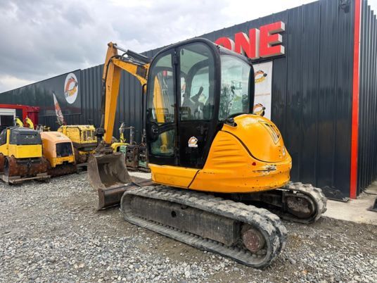 2010 JCB 8055 mini excavator, rear three-quarter view