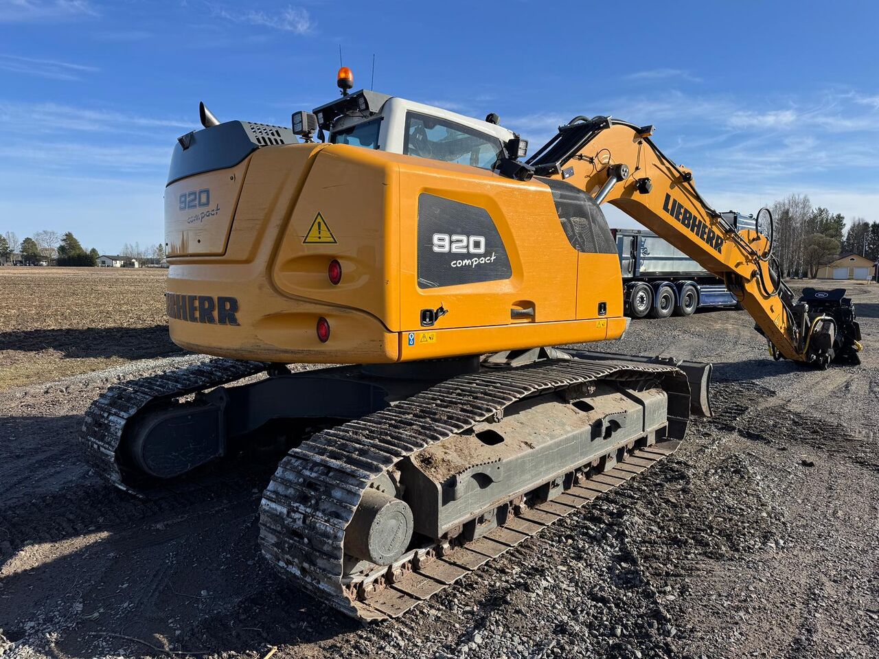 2019 Liebherr R920 Compact crawler excavator, rear three-quarter view 2019 Liebherr R920 Compact crawler excavator, rear three-quarter view