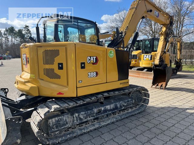 2024 Caterpillar 308 mini excavator, rear three-quarter view 2024 Caterpillar 308 mini excavator, rear three-quarter view