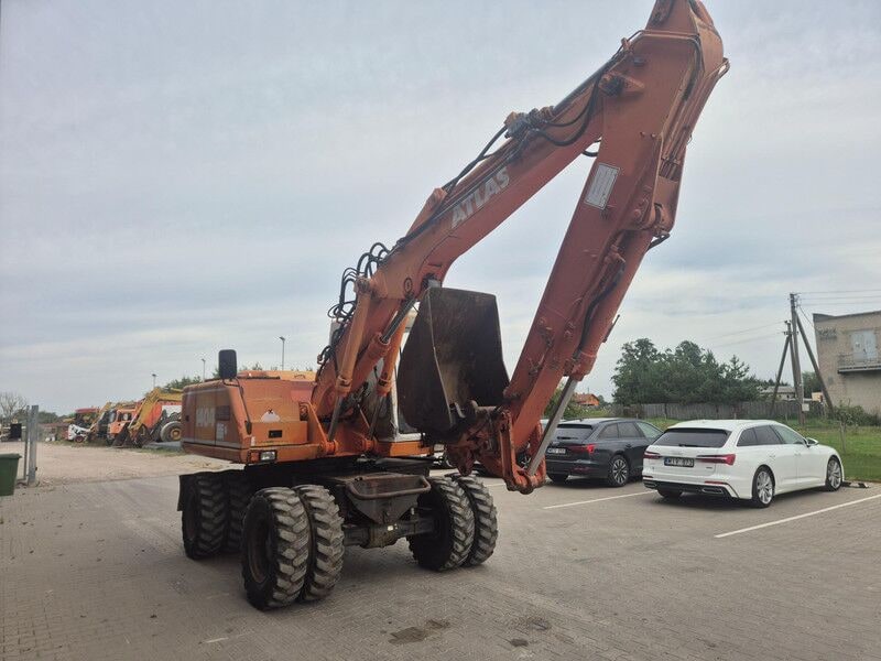 2001 Atlas 1404 wheel excavator, rear three-quarter view 2001 Atlas 1404 wheel excavator, rear three-quarter view