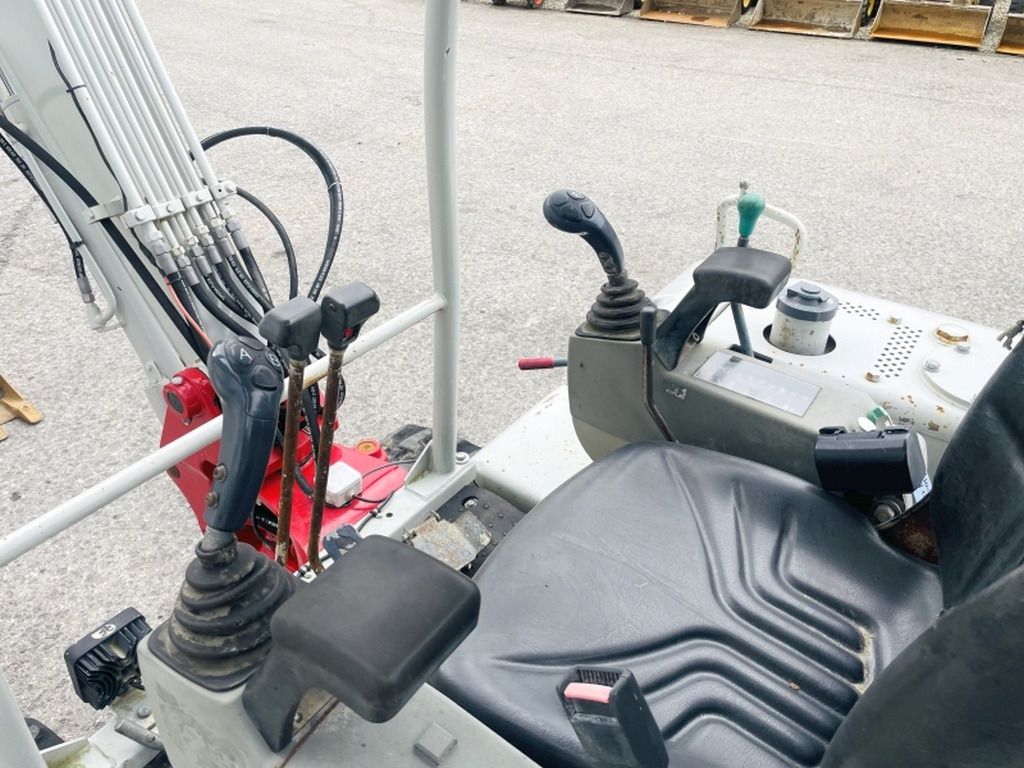 2005 Takeuchi TB135 mini excavator operator station view 2005 Takeuchi TB135 mini excavator operator station view