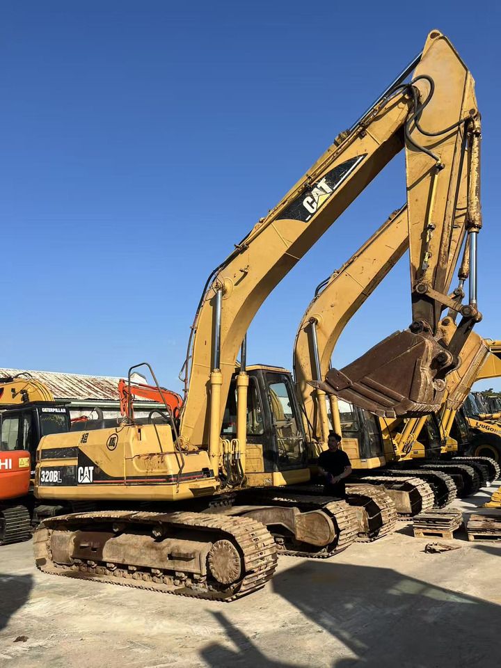 2019 Caterpillar 320BL crawler excavator, side profile view 2019 Caterpillar 320BL crawler excavator, side profile view
