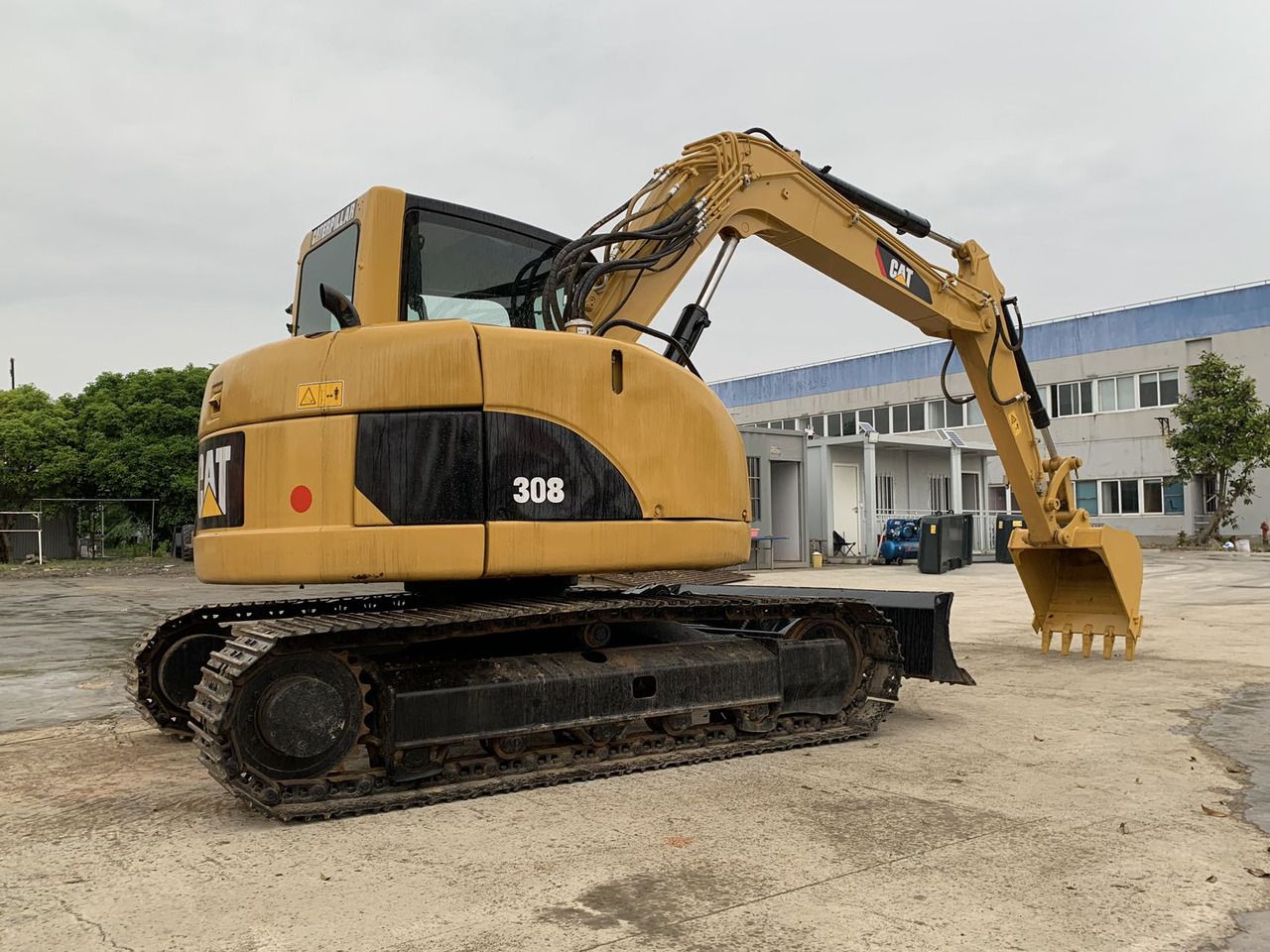 2020 Caterpillar 308 crawler excavator, rear three-quarter view