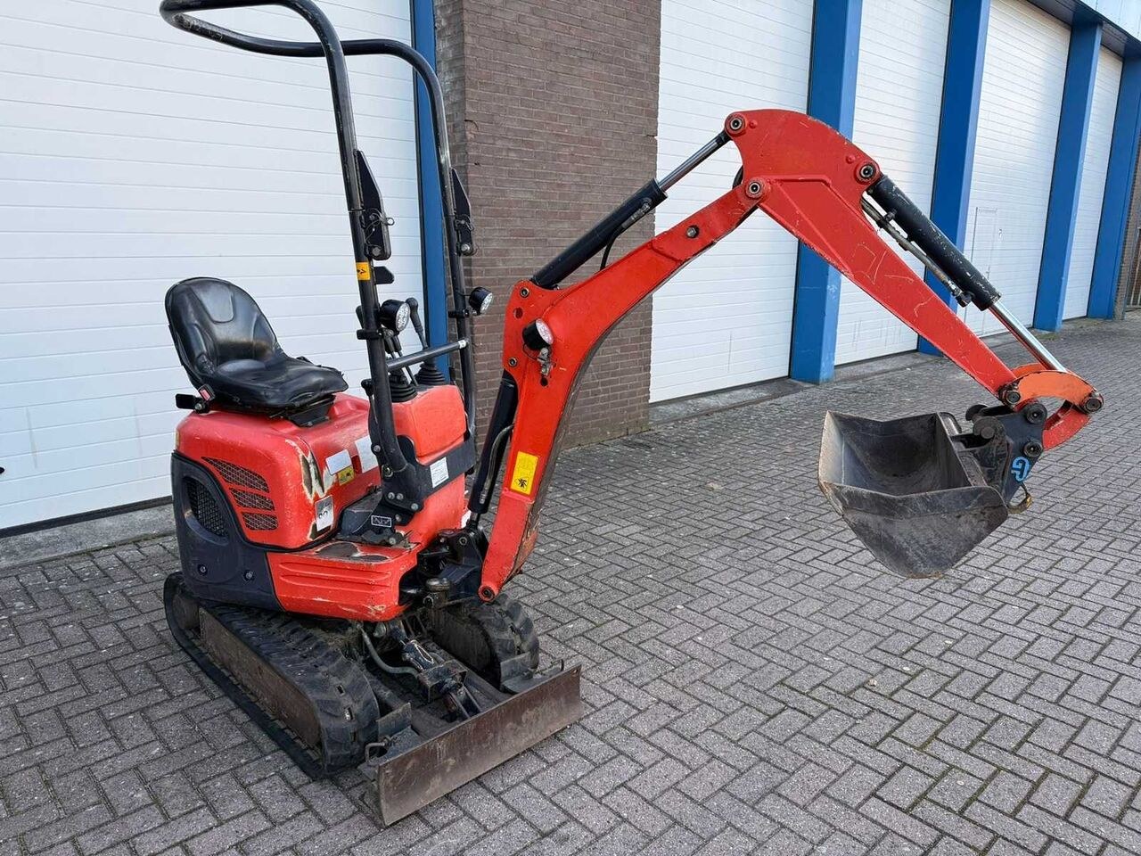 2014 Kubota U10-3 mini excavator, rear three-quarter view