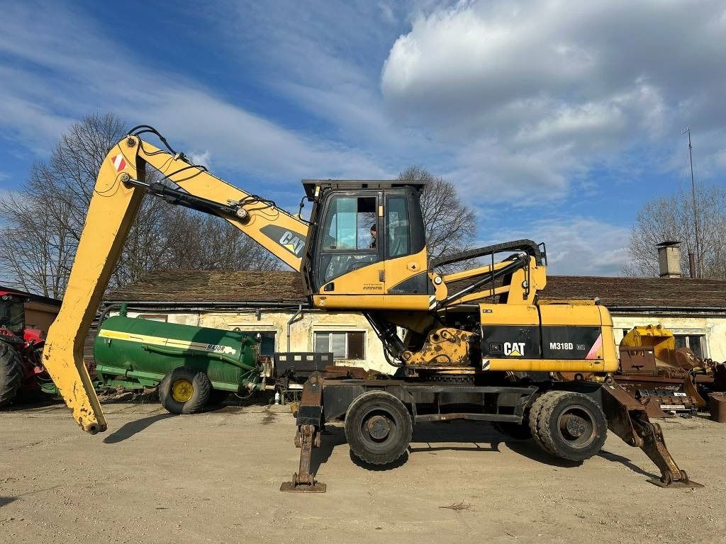 2008 Caterpillar M318D MH material handler, side view 2008 Caterpillar M318D MH material handler, side view