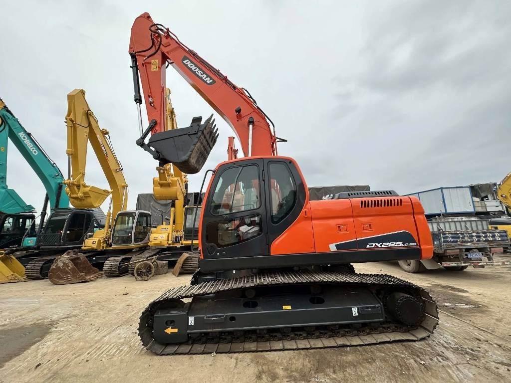 2023 Doosan DX225LC-9C crawler excavator, side profile view