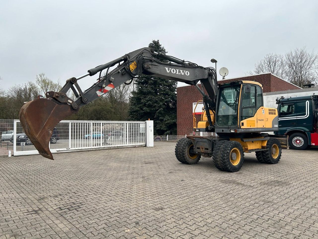 2008 Volvo EW140C wheel excavator, side view