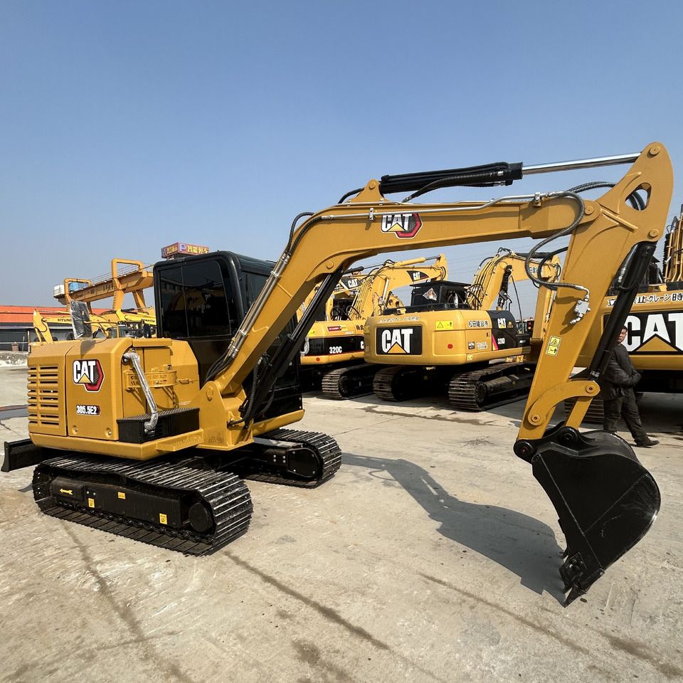 2023 Caterpillar 305.5E2 mini excavator, side view