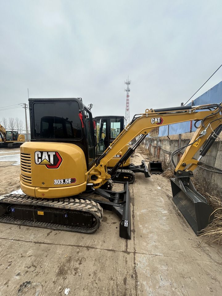 2024 Caterpillar 303.5E mini excavator, rear three-quarter view 2024 Caterpillar 303.5E mini excavator, rear three-quarter view