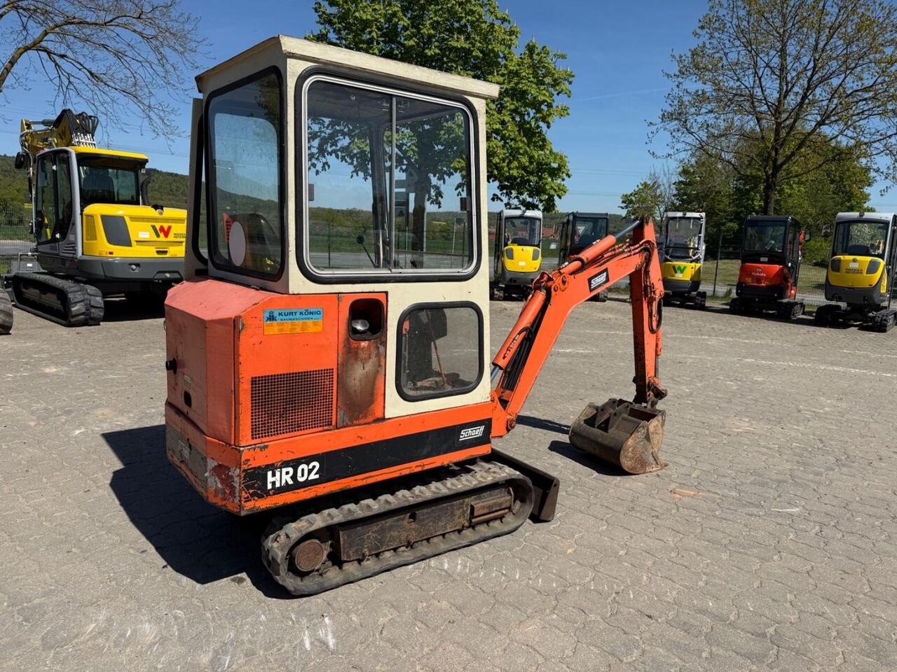 1990 Schaeff HR02 mini excavator, rear three-quarter view 1990 Schaeff HR02 mini excavator, rear three-quarter view