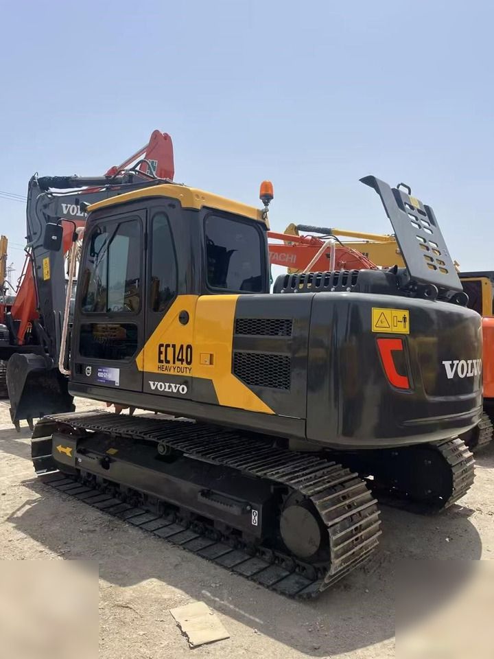 2022 Volvo EC140 crawler excavator, rear three-quarter view 2022 Volvo EC140 crawler excavator, rear three-quarter view