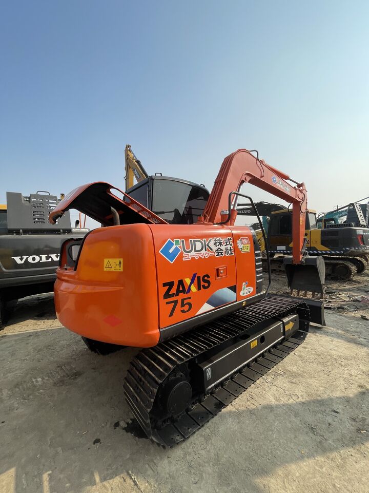2023 Hitachi Zaxis 75 crawler excavator, rear three-quarter view 2023 Hitachi Zaxis 75 crawler excavator, rear three-quarter view