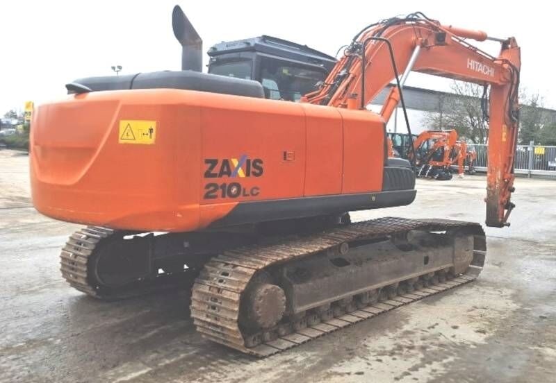2016 Hitachi Zaxis 210LC crawler excavator, rear three-quarter view 2016 Hitachi Zaxis 210LC crawler excavator, rear three-quarter view