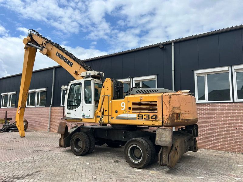 2012 Liebherr A934C material handler, rear three-quarter view 2012 Liebherr A934C material handler, rear three-quarter view