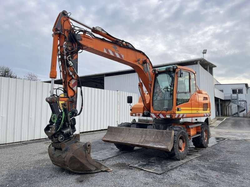 2012 Volvo EW140D wheel excavator, side profile view