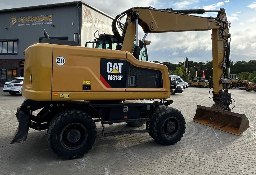 2016 Caterpillar M318F wheel excavator side view 2016 Caterpillar M318F wheel excavator side view