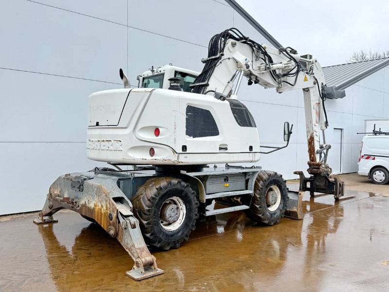 2012 Liebherr A914 COMPACT wheel excavator, rear three-quarter view 2012 Liebherr A914 COMPACT wheel excavator, rear three-quarter view
