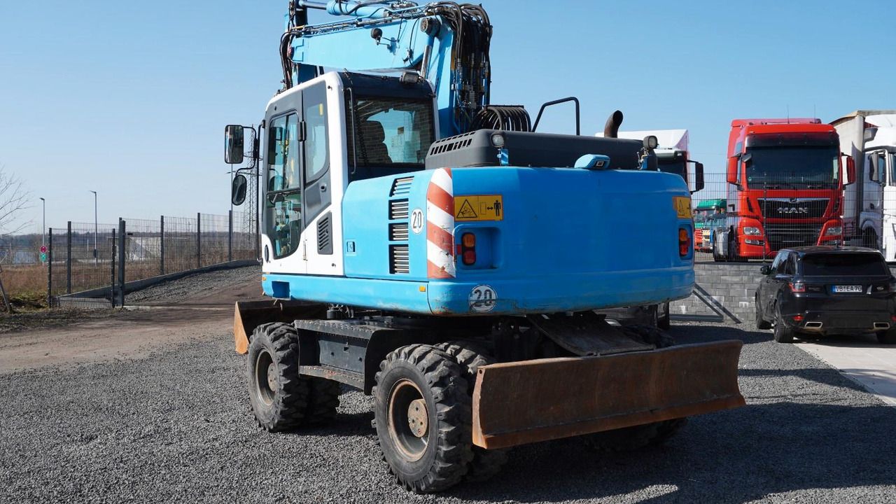 2013 Komatsu PW160-8 wheel excavator, rear three-quarter view 2013 Komatsu PW160-8 wheel excavator, rear three-quarter view